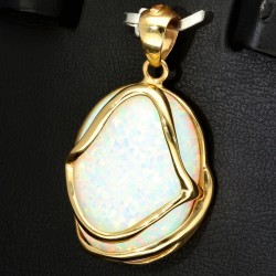 Eindrucksvoller Anhänger mit großem, eingefassten Opal in hochwertigem 14K / 585 Gold