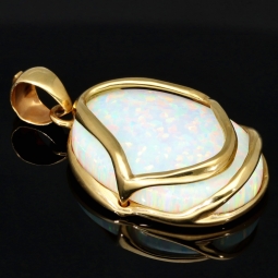 Eindrucksvoller Anhänger mit großem, eingefassten Opal in hochwertigem 14K / 585 Gold