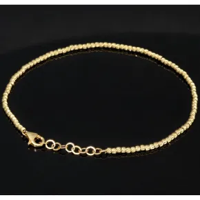 Längenverstellbares Armband, mit vielen kleinen Goldkügelchen bestückt, aus 585 14K Gelbgold in ca. 17,5 - 20 cm Länge