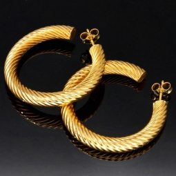 Twist - Creolen in zeitlosem Design aus funkelndem 333er / 8K Gold