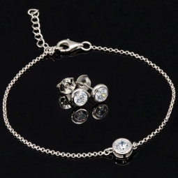 Edles Schmuck-Set aus funkelndem 925er Sterling Silber - Elegantes Armband und funkelnde Ohrstecker mit brillantgeschliffenen Zirkoniasteinen (Diamantimitat)