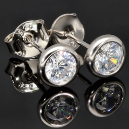 Edles Schmuck-Set aus funkelndem 925er Sterling Silber - Elegantes Armband und funkelnde Ohrstecker mit brillantgeschliffenen Zirkoniasteinen (Diamantimitat)