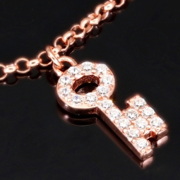 Exquisites Silber-Armband / Bettelarmband aus edlem Sterling 925 Silber rosé vergoldet mit fantasievollen Anhängern, verziert mit zahlreichen funkelnden Zirkoniasteinen (Diamantoptik), längenverstellbar ca. 17 – 20 cm