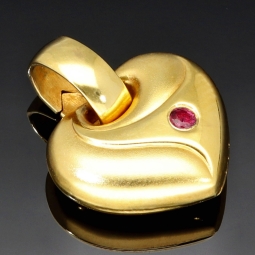 Zeitlos schöner Herzanhänger aus 333er Bicolor-Gold mit rotem Zirkonia
