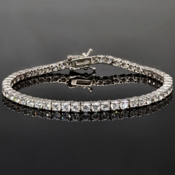 Exquisites Zirkonia-Armband aus 925 Sterling Silber, rhodiniert, besetzt mit vielen leuchtenden Zirkoniasteinen m Brillantschliff (Diamantimitationen) ca: 18cm