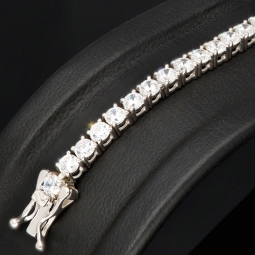 Exquisites Zirkonia-Armband aus 925 Sterling Silber, rhodiniert, besetzt mit vielen leuchtenden Zirkoniasteinen m Brillantschliff (Diamantimitationen) ca: 18cm