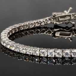 Exquisites Zirkonia-Armband aus 925 Sterling Silber, rhodiniert, besetzt mit vielen leuchtenden Zirkoniasteinen m Brillantschliff (Diamantimitationen) ca: 18cm