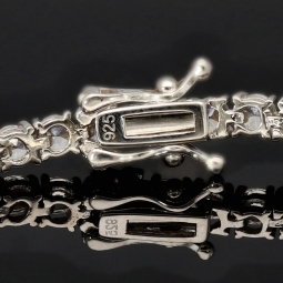 Exquisites Zirkonia-Armband aus 925 Sterling Silber, rhodiniert, besetzt mit vielen leuchtenden Zirkoniasteinen m Brillantschliff (Diamantimitationen) ca: 18cm