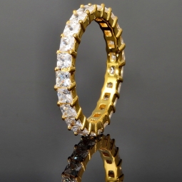 Stylischer Ring mit funkelnden Zirkoniasteinen (Diamant-Imitation im Smaragdschliff) – 925er Silber vergoldet - RG 52