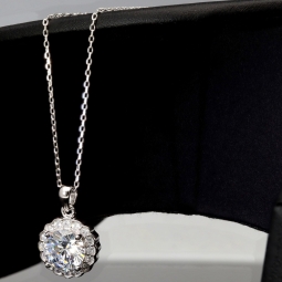 Feines Schmuckset aus 925er Sterlingsilber mit funkelndem Zirkonia im Brillantschliff (Diamantimitat) in Krappen gefasst