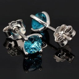 Exquisite Ohrstecker aus 925 Sterling Silber bestückt mit 2 größeren, leuchtenden blauen Zirkoniasteinen (Diamantimitationen) in Krappen gefasst