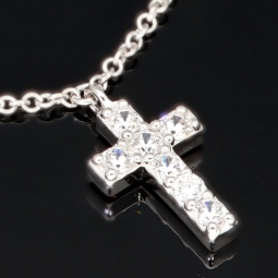 Stilvolle Halskette aus rhodiniertem 925er Silber mit eingearbeiteten Charms (Kreuz, Schleife und Anker) mit Zirkoniasteinen besetzt (Diamantimitationen), ca. 42-45 länge verstellbar
