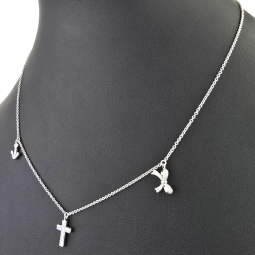 Stilvolle Halskette aus rhodiniertem 925er Silber mit eingearbeiteten Charms (Kreuz, Schleife und Anker) mit Zirkoniasteinen besetzt (Diamantimitationen), ca. 42-45 länge verstellbar