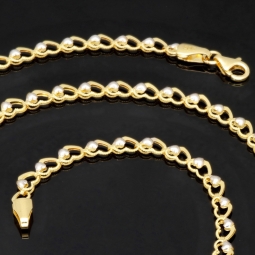 Funkelnde Goldkette für Damen in außergewöhnlichem Herz-Design aus hochwertigem Gold 585 / 14k (Bicolor Gelb- und Weißgold) ca. 50cm Länge, ca. 4mm