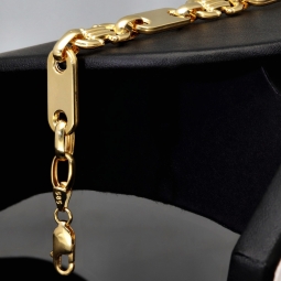 Steigbügel- und Plättchenarmband-Mix, gefertigt aus 585er (14 Karat) Gelbgold. Länge ca. 20 cm, Breite 8mm – hochwertig verarbeitet und klassisch-modern im Design