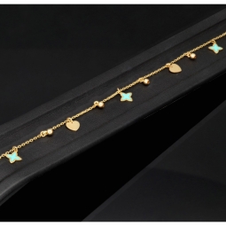 Trendiges Goldarmband mit glänzenden, eingearbeiteten Anhängern und Goldperlen (585er 14k), ca. 19cm lang