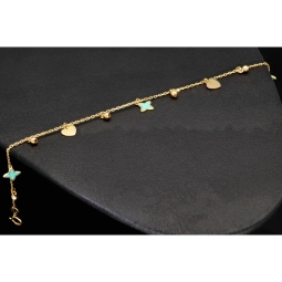 Trendiges Goldarmband mit glänzenden, eingearbeiteten Anhängern und Goldperlen (585er 14k), ca. 19cm lang