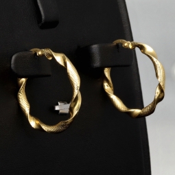 Außergewöhnliche Twist - Creolen in mit feinem halb polierten, halb fein rautiertem Design aus hochwertigem 585 / 14K Gold