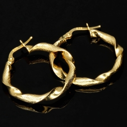 Außergewöhnliche Twist - Creolen in mit feinem halb polierten, halb fein rautiertem Design aus hochwertigem 585 / 14K Gold