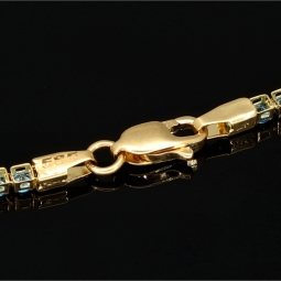 Funkelndes Tennisarmband mit leuchtend, blauen Zirkoniasteinen aus 585 14K Gold in (ca. 18 cm Länge)