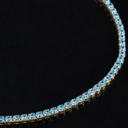 Funkelndes Tennisarmband mit leuchtend, blauen Zirkoniasteinen aus 585 14K Gold in (ca. 18 cm Länge)