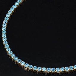 Funkelndes Tennisarmband mit leuchtend, blauen Zirkoniasteinen aus 585 14K Gold in (ca. 18 cm Länge)