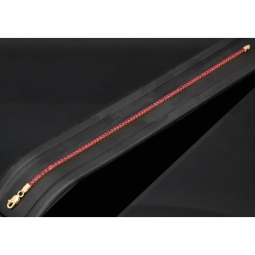 Hochwertiges produziertes 585 / 14K Gold Tennisarmband mit strahlenden pink-lila Zirkoniasteinen (ca. 18,5 cm)