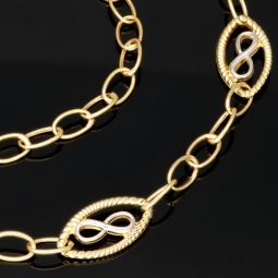 Edle Bicolor-Ankerkette aus 14K (585) Gold – stilvolle Kombination aus Gelb- und Weißgold mit fein gearbeiteten Infinity-Elementen - Länge ca. 50 cm, Breite ca. 4,5 mm