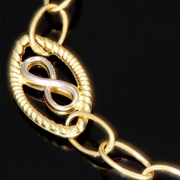 Bicolor-Ankerarmband aus 14K (585) Gold – Kombination aus Gelb- und Weißgold mit filigran gearbeiteten Infinity-Elementen  (ca. 20,5 cm)