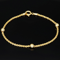 Glänzendes Twist-Armband / Kordelarmband mit stilvoll eingearbeiteten Goldperlen aus hochwertigem 585 14k Gold, ca. 2mm breit, 18,5cm lang