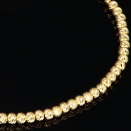 Fein gearbeitetes Armband aus 585 14K Gelbgold, dekoriert mit vielen kleinen Goldkügelchen und einem Zirkonia - ca. 18 - 20 cm längenverstellbar