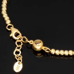 Fein gearbeitetes Armband aus 585 14K Gelbgold, dekoriert mit vielen kleinen Goldkügelchen und einem Zirkonia - ca. 18 - 20 cm längenverstellbar