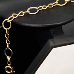 Glänzendes Bicolor-Ankerarmband aus 14K (585) Gold – Kombination aus Gelb- und Weißgold mit hochwertig gearbeiteten Infinity-Elementen (ca. 21cm)