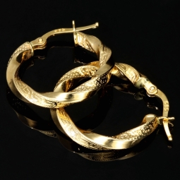 Glänzende Greco-Creolen in zeitlosem Twist-Design aus funkelndem 585er / 14K Gold