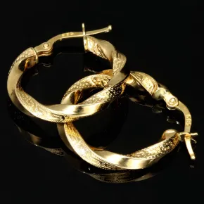 Glänzende Greco-Creolen in zeitlosem Twist-Design aus funkelndem 585er / 14K Gold