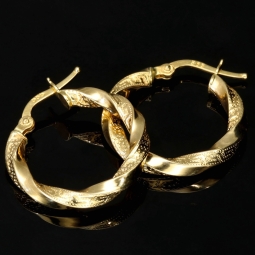 Glänzende Greco-Creolen in zeitlosem Twist-Design aus funkelndem 585er / 14K Gold