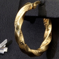 Glänzende Greco-Creolen in zeitlosem Twist-Design aus funkelndem 585er / 14K Gold