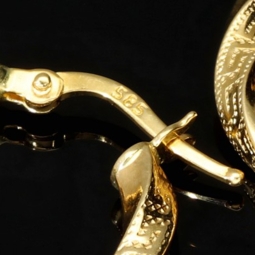 Glänzende Greco-Creolen in zeitlosem Twist-Design aus funkelndem 585er / 14K Gold