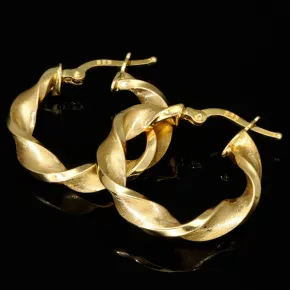 Edle Spiral-Creolen in mit feinem halb polierten, halb mattierten Design aus hochwertigem 585 / 14K Gold
