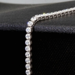 Edles Bling-Bling Tennisarmband mit weißen, leichtenden Zirkonia in 585 14K Gold in (ca. 18cm Länge)