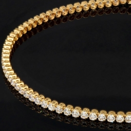 Funkelndes Tennisarmband mit weißen Zirkoniasteinen aus Gelbgold (585 14K Gold) in ca. 20,5 cm Länge