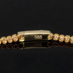 Funkelndes Tennisarmband mit weißen Zirkoniasteinen aus Gelbgold (585 14K Gold) in ca. 20,5 cm Länge