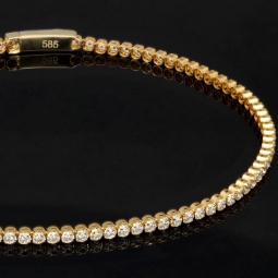 Funkelndes Tennisarmband mit weißen Zirkoniasteinen aus Gelbgold (585 14K Gold) in ca. 20,5 cm Länge