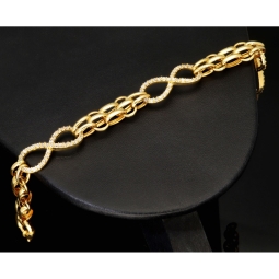 Exklusives Goldarmband mit eingearbeiteten Unendlichkeits-Elementen präzise besetzt mit weißen Zirkoniasteinen in 585 14K Gold in (ca. 20 cm Länge, ca. 9 mm Breite)