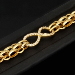Exklusives Goldarmband mit eingearbeiteten Unendlichkeits-Elementen präzise besetzt mit weißen Zirkoniasteinen in 585 14K Gold in (ca. 20 cm Länge, ca. 9 mm Breite)