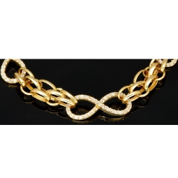 Exklusives Goldarmband mit eingearbeiteten Unendlichkeits-Elementen präzise besetzt mit weißen Zirkoniasteinen in 585 14K Gold in (ca. 20 cm Länge, ca. 9 mm Breite)