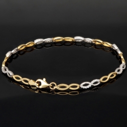 Fein gearbeitetes Bicolor Gold-Armband aus hochwertigem 14K 585 Gelbgold und Weißgold in elegantem Design mit Zirkonia besetzt (ca. 19,5 cm)