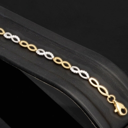 Fein gearbeitetes Bicolor Gold-Armband aus hochwertigem 14K 585 Gelbgold und Weißgold in elegantem Design mit Zirkonia besetzt (ca. 19,5 cm)