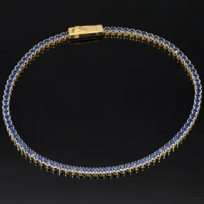Trendiges Tennisarmband mit funkelnden, dunkelblauen Zirkonia aus hochwertigem 14K 585er Gold in (ca. 18,5 cm Länge)