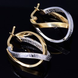 Wunderschöne geschwungene  Designer - Creolen in Bicolor 585er (14K) Weiß- und Gelbgold